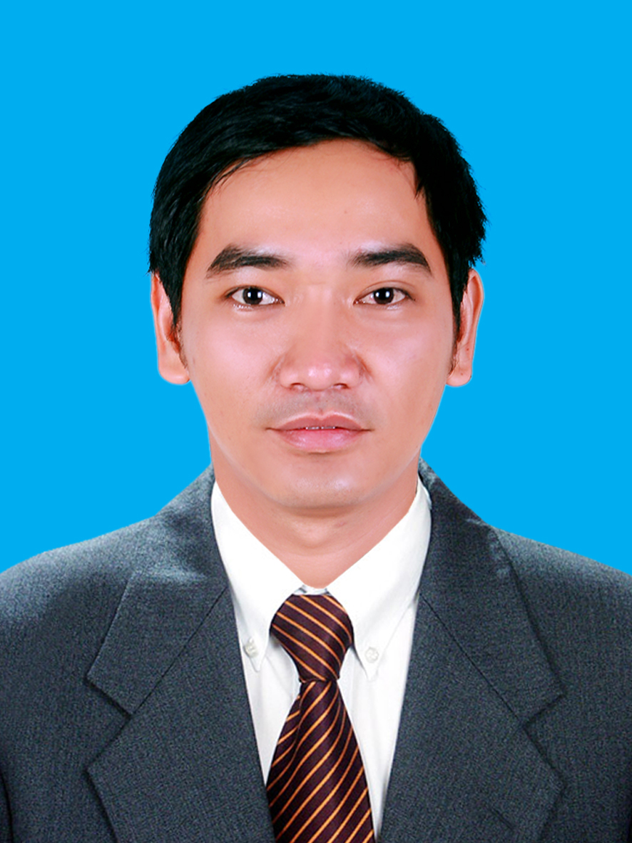 A person in a suit and tie Description automatically generated